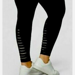 Torrid slash back leggings size 2